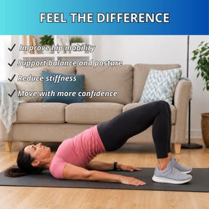 May include: A woman in a pink shirt and black leggings performs a bridge exercise on a black mat. Text at the top reads "FEEL THE DIFFERENCE" with bullet points: Improve hip mobility, Support balance and posture, Reduce stiffness, and Move with more confidence.