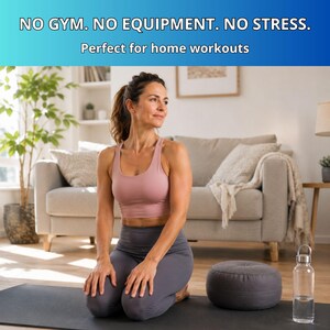 May include: A woman in a pink sports bra and gray leggings kneels on a black yoga mat. A gray meditation cushion and a clear water bottle are nearby. The text at the top reads: "NO GYM. NO EQUIPMENT. NO STRESS."