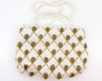 Bolso de noche vintage Art Déco de los años 60 con cuentas en blanco y dorado de Goldco
