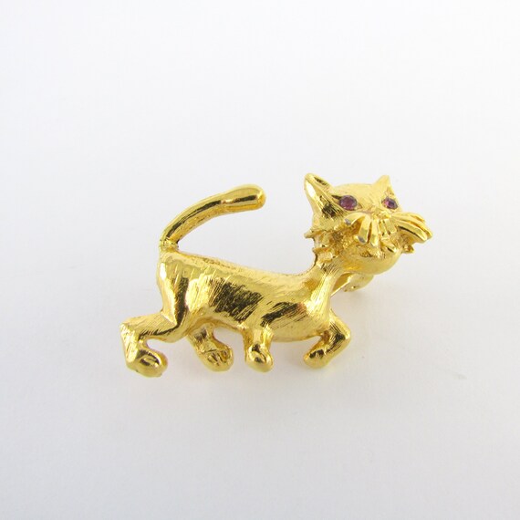 Bronze-y gold with malachite necklace. Cat brooch