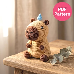 以下が含まれることがあります： 手作りの木製サインで、手書き風の「Welcome to our home」の文字が入っています。サインは白く塗装され、濃い色のフレームが付いています。小さな装飾的なハートが右下にあります。