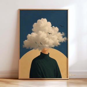May include: A framed wall art print featuring a person wearing a dark green turtleneck jumper. The person's head is replaced by a large, fluffy white cloud against a deep blue sky. A large, pale yellow circle sits behind the figure, and several small black birds are flying around the cloud.