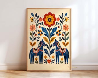 May include: A framed vertical wall art print featuring a cream background with two symmetrical blue horses facing each other. The design includes a large central red flower, smaller orange and yellow floral elements, and dark blue leaves.