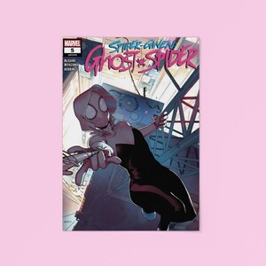 K&ouml;nnte beinhalten: Eine wei&szlig;e Keramik-Tasse mit schwarzem Henkel und dem Text "But First, Coffee" in fetter, schwarzer Schrift. Die Tasse steht vor einem verschwommenen Hintergrund, der ihr schlichtes Design hervorhebt.