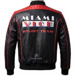 May include: A white ceramic mug with a black handle and the text "But First, Coffee" in a bold, black font. The mug is set against a blurred background, suggesting a cozy setting. The mug appears to be approximately 4 inches tall.