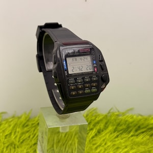 Reloj Casio CMD-40 vintage con control remoto para TV: alarma, calculadora, fabricado en Japón.