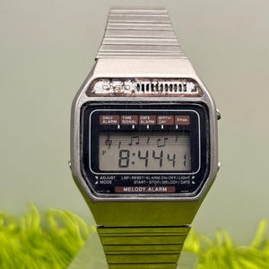 Vintage Casio 82 H111 Stainless Steel Melody Alarm Digital Quartz Men's Watch JAPAN MADE