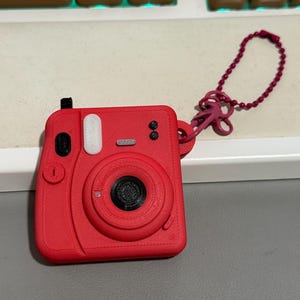 Instax Mini - Llavero con foto emergente