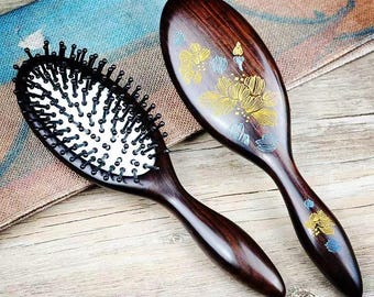 Peigne en bois de santal noir sculpté à la main, brosse de massage du cuir chevelu à coussin d'air, outil démêlant pour incrustations de lotus