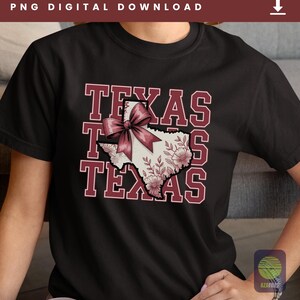 May include: Black t-shirt featuring the word "TEXAS" stacked three times in maroon with a white outline. A map of Texas is in the center, adorned with a maroon bow and floral design. The words "PNG DIGITAL DOWNLOAD" are at the top.