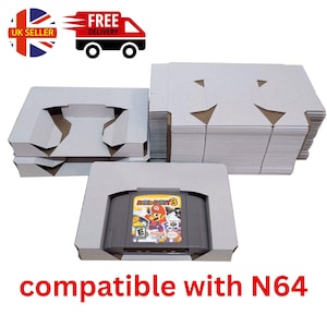 May include: Gray cardboard game cartridge protectors with a Mario Party 3 N64 game cartridge. The text "compatible with N64" is displayed in red. The image also includes a UK seller logo and a free delivery logo.