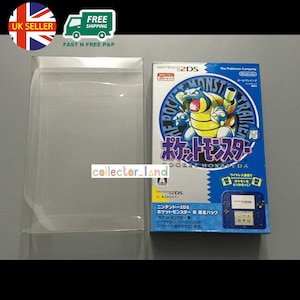 May include: A Nintendo 2DS game box with a blue and yellow Pokémon character, in a clear plastic case. The box has Japanese text, including "Pocket Monsters" and "Nintendo 2DS". The box is a limited edition.