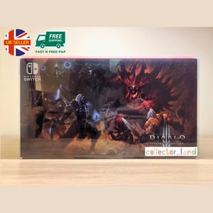 Puede incluir: Una caja de juego de Nintendo Switch con ilustraciones de Diablo III: Eternal Collection. La caja muestra una escena de fantasía oscura con personajes y un demonio de fuego. El logotipo de Nintendo Switch es visible.