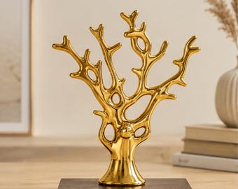 Gouden kerstboomversiering, luxe keramische woondecoratie, gouden en zilveren kerstboomsculptuur, moderne woonkamerdecoratie, feestelijke huisdecoratie