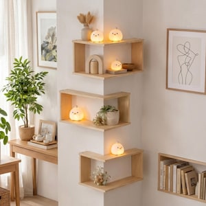 May include: A rustic wooden sign with the text "Welcome to our home" in white lettering. The sign features a distressed finish and a simple, inviting design, perfect for a front porch or entryway.