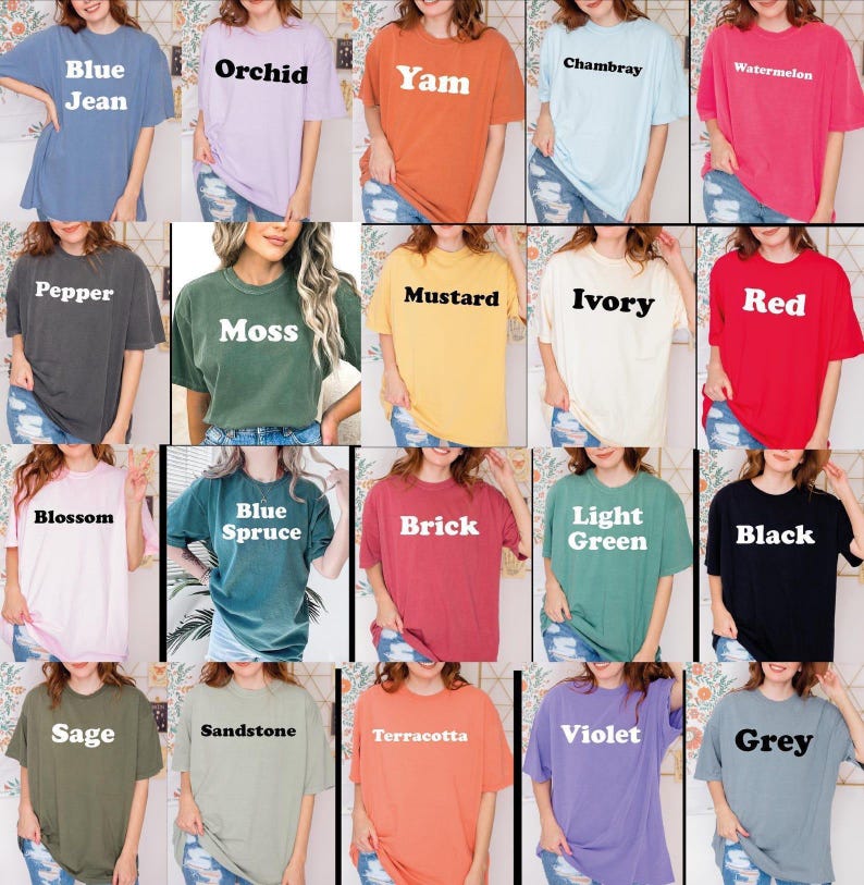 May include: A selection of short-sleeved t-shirts in a range of colours. The colours include blue jean, orchid, yam, chambray, watermelon, pepper, moss, mustard, ivory, red, blossom, blue spruce, brick, light green, black, sage, sandstone, terracotta, violet, and grey.