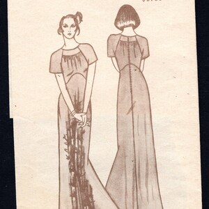 May include: Vintage Paula Patterns sewing pattern featuring two illustrations of a long dress. The pattern includes the text "2003 A MISSES' 6 10 14 make any one". The address "519 Reed Lane Honolulu, Hawaii 96813" is also visible.