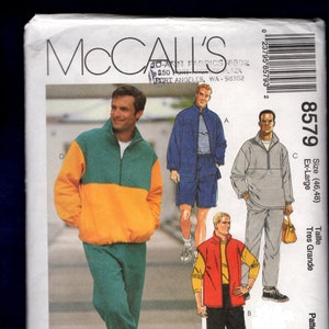 May include: McCall's sewing pattern featuring illustrations of men's sportswear. The pattern includes a color-blocked jacket and matching pants, a blue jacket and shorts set, a gray pullover and pants set, and a red vest with black pants.