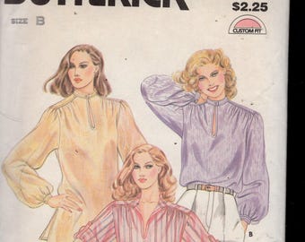 Butterick 3671 wijd vallende tuniek met zijsplitten en blouse met bandkraag, lange mouwen en manchetten, sleutelgat vooraan, maten 8-18, ONBESNEDEN