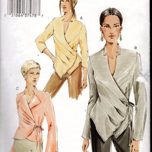 May include: Vogue Patterns sewing pattern V7828. The image shows illustrations of three wrap-style jackets in different colors: yellow, gray, and pink. The pattern includes sizes 18, 20, and 22.