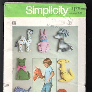May include: A Simplicity sewing pattern for making stuffed animals. The pattern includes instructions for making a camel, rabbit, dog, cat, kangaroo, elephant, and horse. The pattern is from November 1976 and costs $1.75.