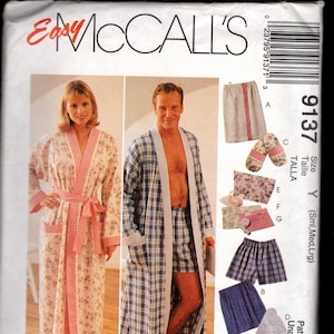 May include: A sewing pattern for a robe with a plaid design. The pattern includes instructions for making a robe for both men and women. The pattern is for sizes small, medium, and large.