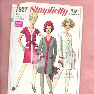 May include: Vintage Simplicity sewing pattern number 7927 for a dress. The pattern is for a size 10 with a 32 1/2 inch bust. The pattern shows three different styles of dresses, one in red, one in green, and one in white.