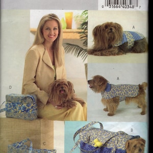 May include: A Butterick sewing pattern B4696/OSZ featuring a woman, a dog, and various dog accessories. The accessories include a dog coat, a tote bag, a small pillow, and a collar. The pattern includes all sizes.