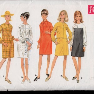 May include: Vintage sewing pattern for a dress with a variety of styles. The pattern is for sizes 16 and bust 38. The pattern includes a plaid dress, a white dress with a floral print, an orange dress with a bow, a yellow dress with a trim, and a black and white dress with a white collar.