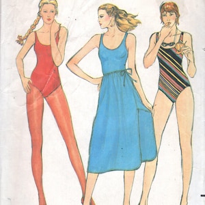 May include: Vintage Butterick sewing pattern featuring illustrations of three swimsuits. The pattern includes a red bodysuit, a blue dress with a tie waist, and a striped swimsuit. The text on the pattern reads "Quick! Butterick" and "John Kloss".
