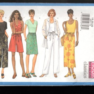 May include: Butterick 5577 sewing pattern envelope featuring illustrations of five different outfits including a black top with patterned pants, a red romper, a green skirt with a v-neck top, a white pant suit with a duster, and a yellow dress.