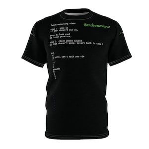 May include: A black short-sleeved t-shirt featuring white text that reads Troubleshooting steps, step 1: show up, if that doesn't fix it, step 2: look cool, if issue persists, step 3: check power source, if that doesn't work, revert back to step 2.