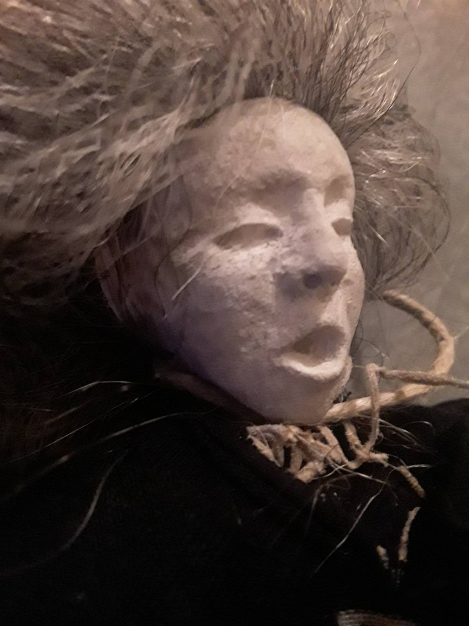 witch with voodoo doll