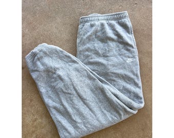 Pantaloni della tuta grigi da uomo Nike XXL con elastico in vita e polsini elasticizzati e fodera in pile E4