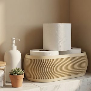 May include: A beige, wavy-edged basket contains several rolls of white toilet paper. A white soap dispenser and a small potted succulent are to the left. The items are on a white marble surface.