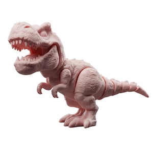 May include: A light pink Tyrannosaurus Rex figurine with an open mouth, showing sharp teeth. The dinosaur has a textured surface and is posed in a dynamic stance, with its arms and legs slightly bent. The toy is set against a white background.