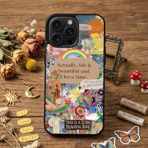 May include: A black phone case with a colorful floral design, a rainbow, and the text "Actually, life is beautiful and I have time." The case also features the text "This is a slow peaceful road."