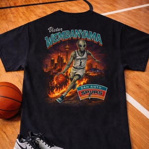 Wembanyama Basketball Player graphic T-Shirt | San Antonio Spurs retro city skyline image 1