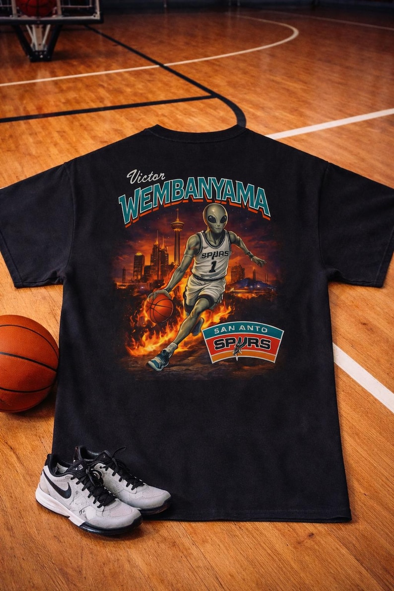 Wembanyama Basketball Player graphic T-Shirt | San Antonio Spurs retro city skyline image 1