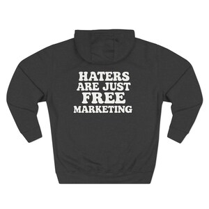 Haters Are Just Free Marketing Hoodie Script Phrase Pullover Quote Streetwear Message Viral Saying I love haters apparel image 4