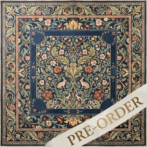 May include: A square textile featuring a dark blue background with a symmetrical pattern of light brown rabbits, green foliage, and pink flowers. A wide decorative border frames the central design. A white diagonal banner displays the text PRE-ORDER.