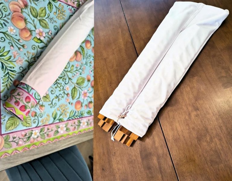 May include: A white fabric storage sleeve containing wooden components. The sleeve is long and rectangular with a drawstring closure at one end. The wooden pieces inside have a light brown finish and a notched, interlocking design structure.