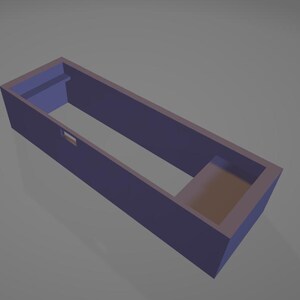 Op de afbeelding: Een 3D-weergave van een rechthoekige, paarsblauwe doos met een open bovenkant en een kleiner, verzonken gedeelte. De doos heeft een eenvoudig, geometrisch ontwerp en staat tegen een grijze achtergrond. De doos lijkt een container te zijn.