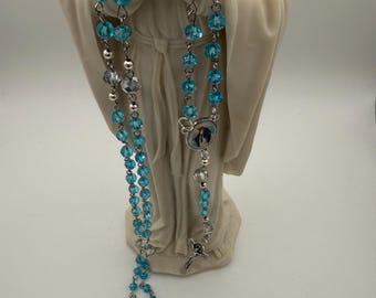 Light Blue Crystal Rosary with Mother Mary Centerpiece.