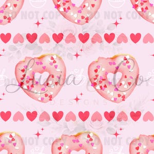 May include: A seamless pattern featuring heart-shaped donuts with sprinkles, alternating with rows of hearts in varying shades of pink and red. The background is a soft pink, with floral and star accents.