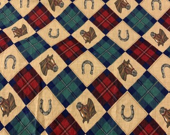 Horse head and horse shoes print fabric.    2/22