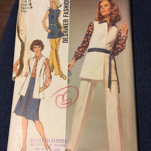 May include: Vintage Simplicity Designer Fashion sewing pattern, number 9304. The pattern features illustrations of women's outfits, including a vest, pants, and a skirt. The cover is yellowed with age and includes the price.