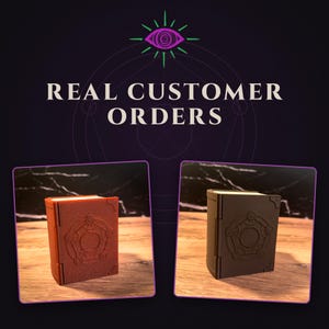 May include: Two small rectangular boxes shaped like books with a circular geometric emblem on the front cover. One box is a textured reddish-brown and the other is a solid dark brown. The text REAL CUSTOMER ORDERS appears above the boxes.