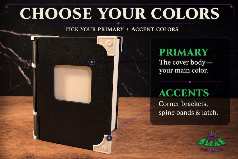 May include: A black book-shaped object with white corner brackets, spine bands, and a latch. The text reads CHOOSE YOUR COLORS, PICK YOUR PRIMARY + ACCENT COLORS, PRIMARY The cover body &mdash; your main color, ACCENTS Corner brackets, spine bands & latch.
