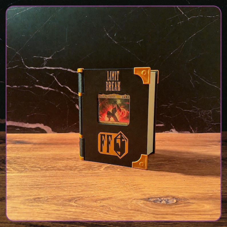 May include: A black rectangular display case for a trading card, featuring the text LIMIT BREAK in gold lettering at the top and an FF logo at the bottom. The case has gold-colored corner accents and a central window displaying a card.